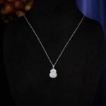 Mother of Pearl Gourd Necklace and Earrings Set in gold plating. The jewelry features a lucky gourd shape made of MOP shell with a CZ accent line across the center.