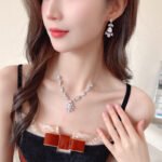 Wholesale Light Luxury Bridal Zircon Necklace Set, featuring a high-end design with brilliant zircon stones and copper settings, perfect wedding accessories for pairing with a formal gown, available in ready stock.