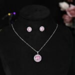 Wholesale zircon jewelry set with round pendant necklace and stud earrings in white gold plated copper from JuneJewelry.com – minimalist fashion jewelry for bulk buyers.