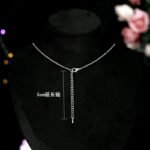 Wholesale zircon jewelry set with round pendant necklace and stud earrings in white gold plated copper from JuneJewelry.com – minimalist fashion jewelry for bulk buyers.