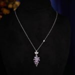 Wholesale leaf jewelry set with sparkling cubic zirconia necklace and earrings in white gold plated copper from JuneJewelry.com – elegant luxury jewelry for bulk buyers.