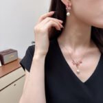 Wholesale Pink Cherry Blossom Jewelry Set on JuneJewelry.com: 18K gold plated copper necklace and earrings with micro-inlaid pink zircon stones, romantic and highly versatile design.