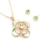 Wholesale X crystal jewelry set with clear micro-pavé Swarovski Elements crystals on 18K white gold plated necklace and matching earrings from JuneJewelry.com.