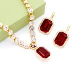 Wholesale emerald cut crystal set with clear rectangular Swarovski Elements crystals, 18K gold plated necklace and drop earrings from JuneJewelry.com.