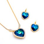 Wholesale pave framed heart crystal jewelry set with blue-green Swarovski element in 18K gold plated and 18K white gold plated brass from JuneJewelry.com.