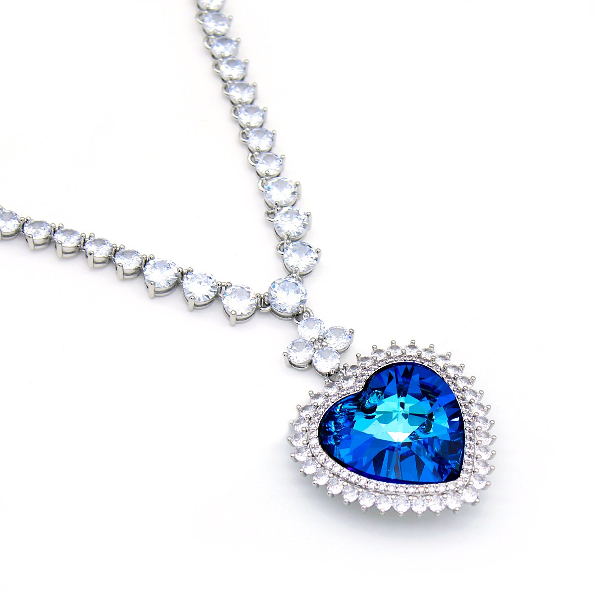 A500007N-001.488.A Wholesale Heart Crystal Necklace with blue heart pendant and crystal tennis chain in 18K gold plated brass from JuneJewelry.com – perfect for bulk fashion jewelry orders.