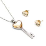 Wholesale key pendant jewelry set with fuchsia heart Swarovski Elements crystal and matching stud earrings – 18K white gold plated fashion jewelry from JuneJewelry.com.