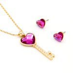 Wholesale key pendant jewelry set with fuchsia heart Swarovski Elements crystal and matching stud earrings – 18K white gold plated fashion jewelry from JuneJewelry.com.