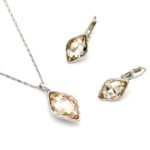 Wholesale kite cut crystal jewelry set in multiple colors (Green, Blue, Clear, Champagne) and 18K Gold/White Gold plated brass from JuneJewelry.com.