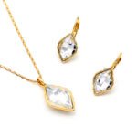 Wholesale kite cut crystal jewelry set in multiple colors (Green, Blue, Clear, Champagne) and 18K Gold/White Gold plated brass from JuneJewelry.com.