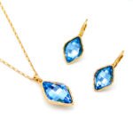Wholesale kite cut crystal jewelry set in multiple colors (Green, Blue, Clear, Champagne) and 18K Gold/White Gold plated brass from JuneJewelry.com.