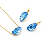 Wholesale modern drop crystal jewelry set in multi-colors (Blue, Pink, Amber, Yellow) and 18K Gold/White Gold plated brass from JuneJewelry.com.