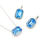 Wholesale bezel set emerald cut crystal jewelry set in Blue and Clear Swarovski elements with 18K Gold and White Gold plated brass from JuneJewelry.com.