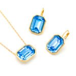 Wholesale bezel set emerald cut crystal jewelry set in Blue and Clear Swarovski elements with 18K Gold and White Gold plated brass from JuneJewelry.com.