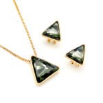 Wholesale triangle crystal jewelry set in multiple colors (Blue, Clear, Black/Grey, Purple/Pink) and 18K Gold/White Gold plated brass from JuneJewelry.com.