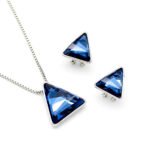 Wholesale triangle crystal jewelry set in multiple colors (Blue, Clear, Black/Grey, Purple/Pink) and 18K Gold/White Gold plated brass from JuneJewelry.com.