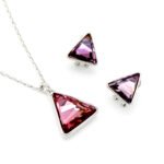 Wholesale triangle crystal jewelry set in multiple colors (Blue, Clear, Black/Grey, Purple/Pink) and 18K Gold/White Gold plated brass from JuneJewelry.com.