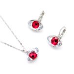 Wholesale Evil Eye jewelry set with blue and clear Swarovski Elements crystals on an 18K plated necklace and matching earrings from JuneJewelry.com.