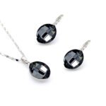 Wholesale large oval stone jewelry set in multiple colors (Clear, Green, Black, Amber) and 18K Gold/White Gold plated brass from JuneJewelry.com.