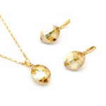 Wholesale large oval stone jewelry set in multiple colors (Clear, Green, Black, Amber) and 18K Gold/White Gold plated brass from JuneJewelry.com.