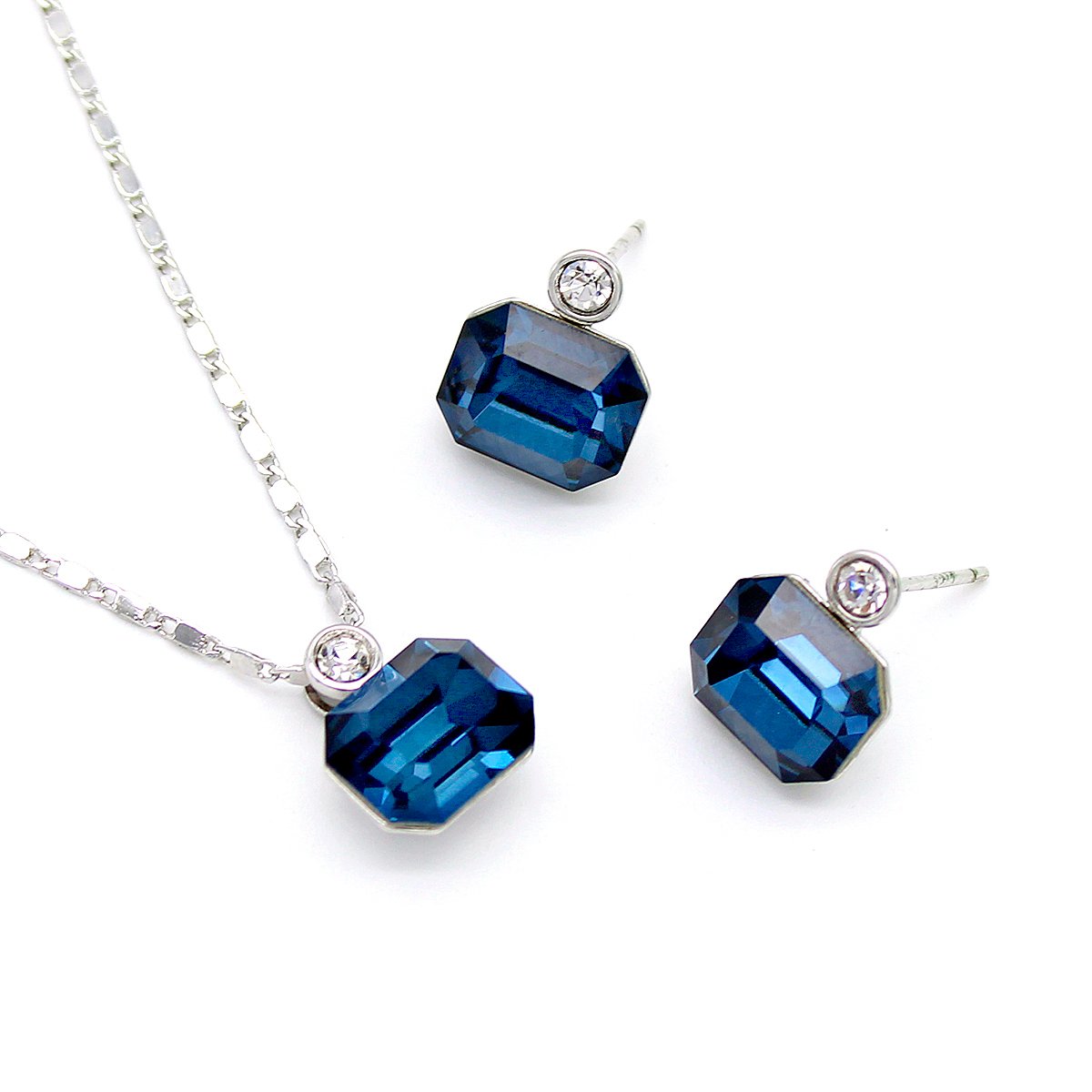 A500587A-001.126.A Collection of wholesale simple single stone crystal jewelry sets including round, oval, triangle, and square shapes in various colors and 18K gold/white gold plated finishes from JuneJewelry.com.