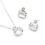 Collection of wholesale simple single stone crystal jewelry sets including round, oval, triangle, and square shapes in various colors and 18K gold/white gold plated finishes from JuneJewelry.com.