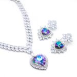 2-Piece Swarovski Element Jewelry Set with Starburst setting, featuring a Marquise cut CZ necklace and large blue heart crystal earrings and pendant.