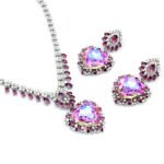 2-Piece Swarovski Element Jewelry Set with full crystal construction, featuring a cascade fringe necklace and matching heart earrings in vibrant blue.