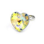 Swarovski Element adjustable heart crystal ring shown in three colors: iridescent golden yellow AB, dual-tone purple/blue AB, and deep sapphire blue, all featuring a large heart crystal.
