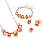 Wholesale Amber Crystal Jewelry Set – rose gold plated necklace, bracelet, ring, and earrings with oval and cushion cut amber and clear crystals – high quality, unique design, factory price, free shipping.