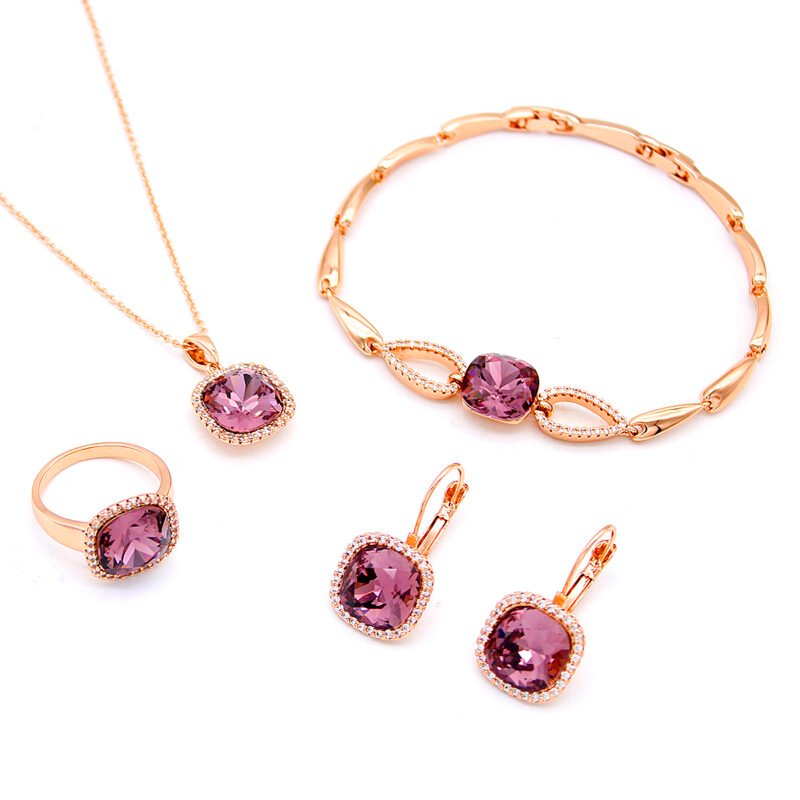 Wholesale Purple Crystal Jewelry Set – rose gold plated necklace, bracelet, ring, and dangle earrings with cushion-cut pink crystals and halo accents – high quality, unique design, factory price, free shipping.