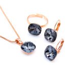 Wholesale Crystal Square Set in rose gold plating with a large faceted purple crystal pendant, drop earrings, and adjustable ring from JuneJewelry.com – unique and high-quality.