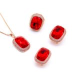 Wholesale crystal pave jewelry set in rose gold plating with a large rectangular smoky grey crystal ring, pendant, and matching stud earrings from JuneJewelry.com – unique and high-quality.