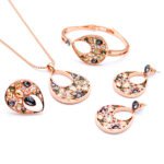 Wholesale Teardrop Crystal Jewelry Set with rose gold plating and multi-color crystals – necklace, bracelet, ring, and earrings from JuneJewelry.com factory price.