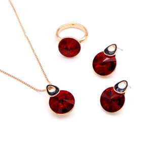 Wholesale crystal round jewelry set in rose gold plating with a large faceted white crystal ring, pendant, and drop earrings with black enamel detail from JuneJewelry.com – unique and high-quality.