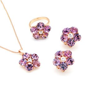 Wholesale crystal flower jewelry set in rose gold plating with a floral ring, pendant, and stud earrings featuring five champagne crystals and a clear center stone from JuneJewelry.com – unique and high-quality.