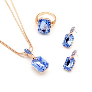 Wholesale clear crystal rectangular jewelry set in rose gold plating with a large faceted white crystal ring, pendant, and matching drop earrings from JuneJewelry.com – unique and high-quality.