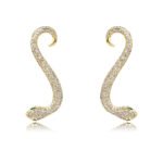 Wholesale snake earrings featuring white zircon pave and green eyes on real gold plated copper from JuneJewelry.com.