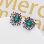 Wholesale turquoise burst earrings with emerald green zircon accents and 925 silver pins from JuneJewelry.com – celestial sunburst jewelry for bulk orders.