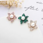 Wholesale pearl flower earrings with micro-pavé zircons and 925 silver needles on 14K gold plated brass from JuneJewelry.com – luxury floral jewelry for bulk orders.