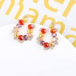 Wholesale pastel crystal earrings with multicolored oval zircon and 925 silver pins from JuneJewelry.com – luxury fashion jewelry for bulk orders.