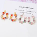 Wholesale pastel crystal earrings with multicolored oval zircon and 925 silver pins from JuneJewelry.com – luxury fashion jewelry for bulk orders.