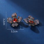 Wholesale flower zircon earrings with pink and yellow crystals on 18K gold plated brass from JuneJewelry.com – luxury floral jewelry for bulk purchase.