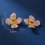 Wholesale flower zircon earrings with pink and yellow crystals on 18K gold plated brass from JuneJewelry.com – luxury floral jewelry for bulk purchase.