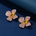 Wholesale flower zircon earrings with pink and yellow crystals on 18K gold plated brass from JuneJewelry.com – luxury floral jewelry for bulk purchase.