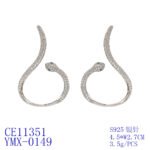 Wholesale serpent hoop earrings with white zircon pavé and green eyes on silver plated copper from JuneJewelry.com – trendy jewelry for bulk orders.