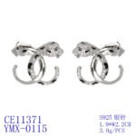 Wholesale leopard stud earrings with white zircon pave and green eyes on silver plated copper from JuneJewelry.com – unique animal jewelry.