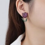 Wholesale tulip zircon earrings with white pave crystals on real gold plated copper from JuneJewelry.com – luxury floral studs.