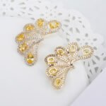 Wholesale lace butterfly earrings with oval zircons and 925 silver needles from JuneJewelry.com – unique filigree fashion jewelry for bulk orders.