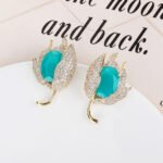 Wholesale purple tulip earrings with oval zircon and 925 silver needles from JuneJewelry.com – luxury floral brass jewelry for bulk orders.